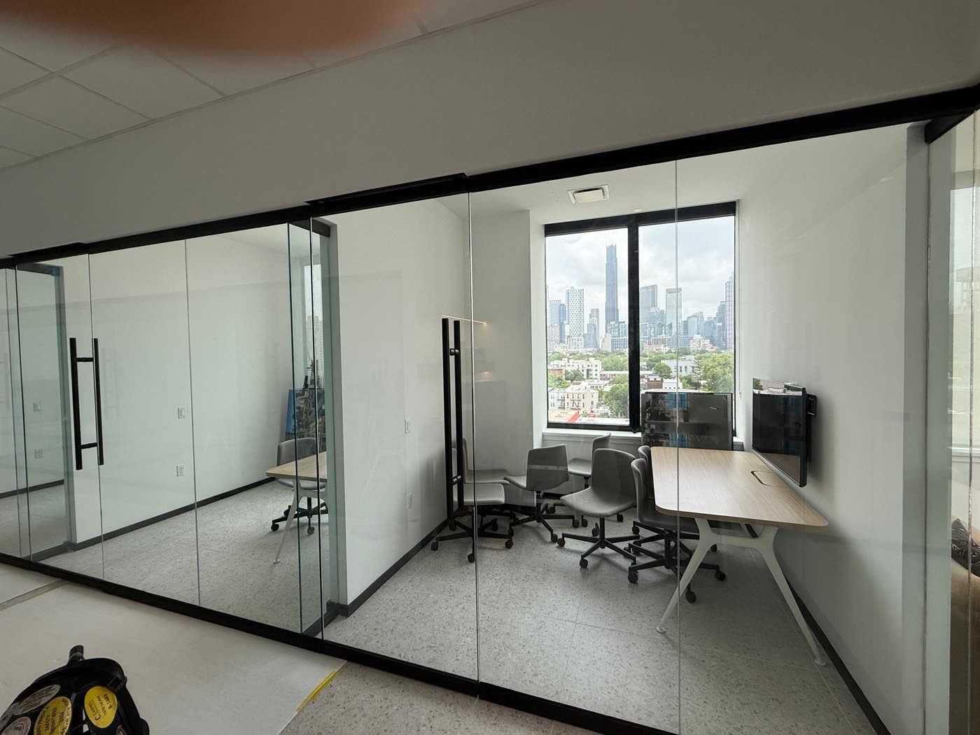 Frameless glass office partition walls and doors
